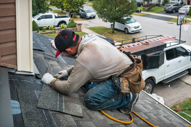 Professional Storm Damage Roof Repair technician working in New Bedford, MA